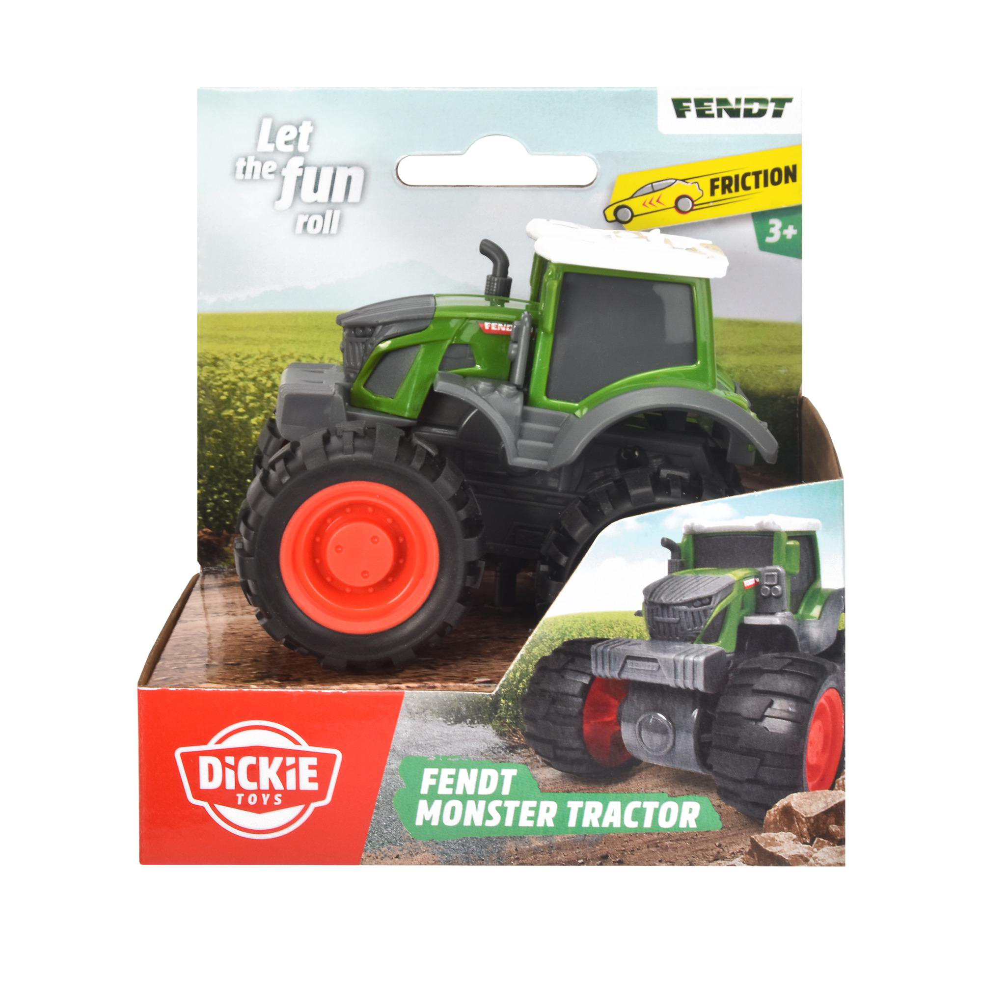 Grüner und schwarzer Spielzeugtraktor in einer Schachtel, mit einem Bild des Traktors auf einem Feld.