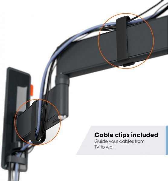 Una vista de cerca de un soporte de TV con clips para cables que sujetan los cables.