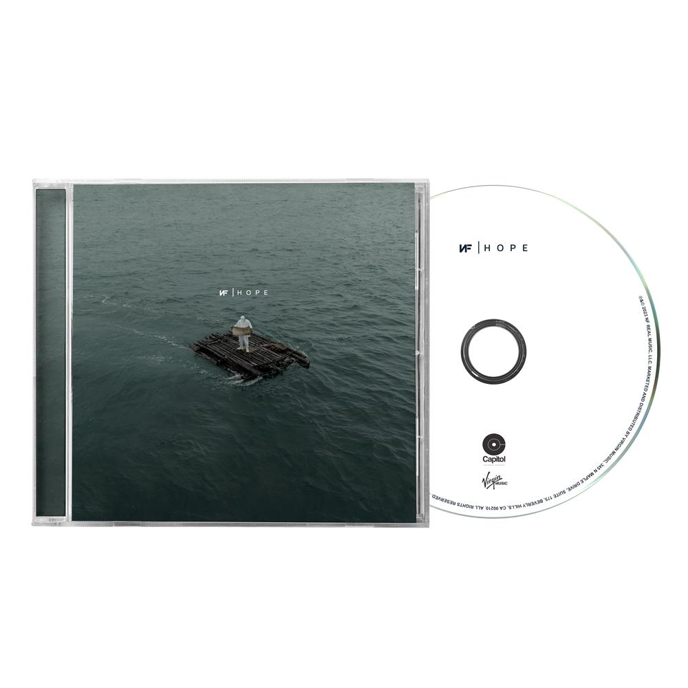 CD album, a borítón egy személy látható egy tutajon a vízben, és a lemez.