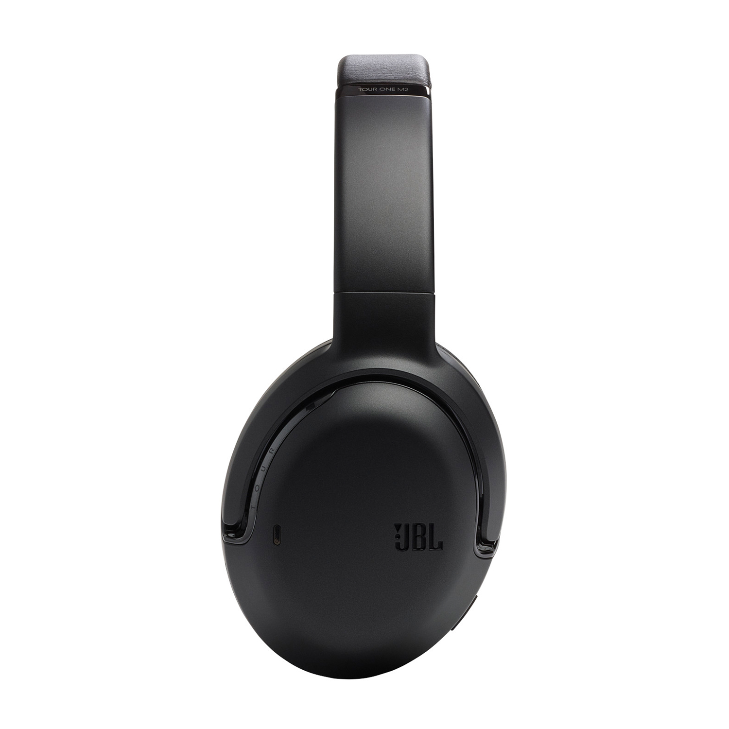 Cuffie JBL nere, vista dall'alto, su sfondo bianco.