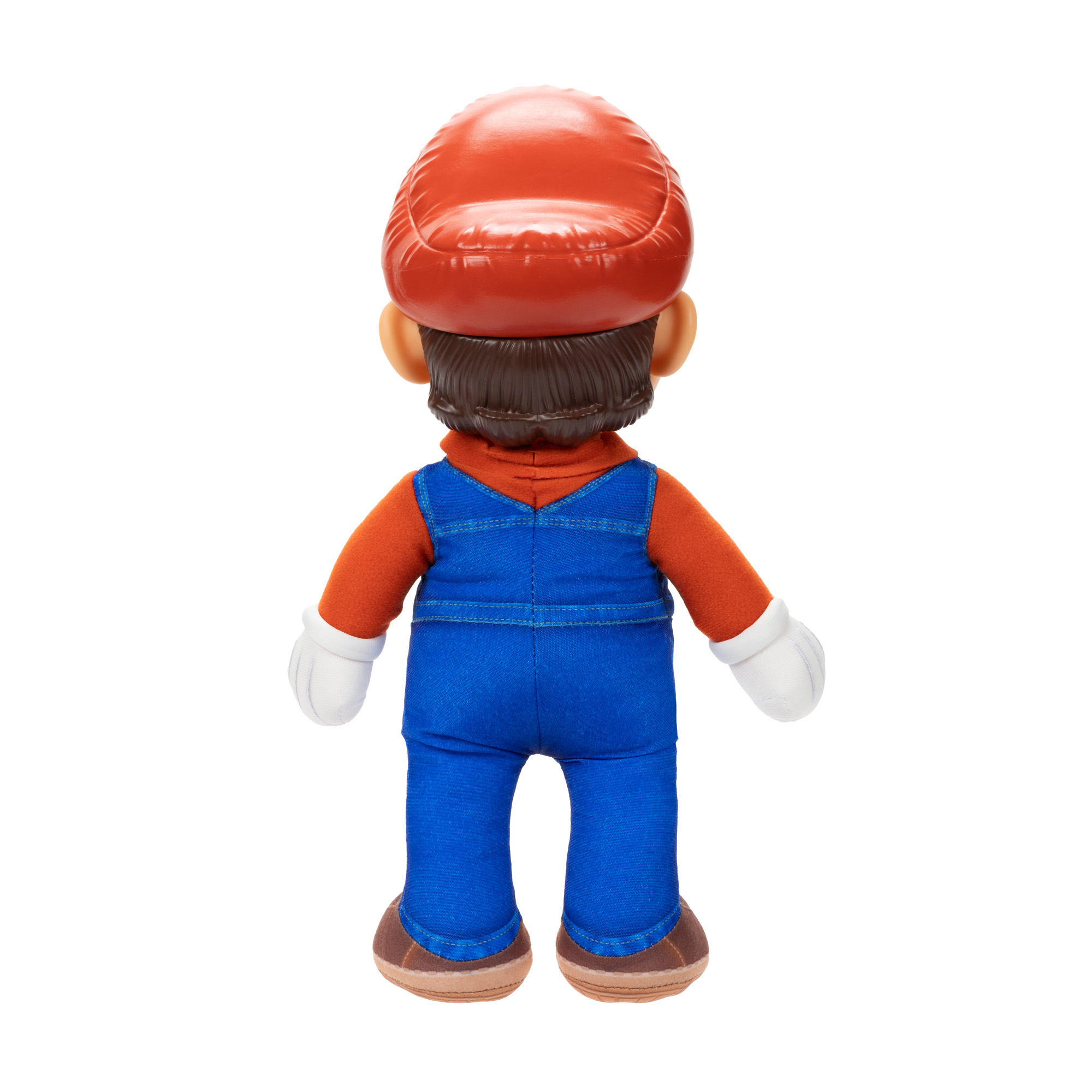 Ein Mario-Plüschtier, von hinten gesehen, trägt Overalls.