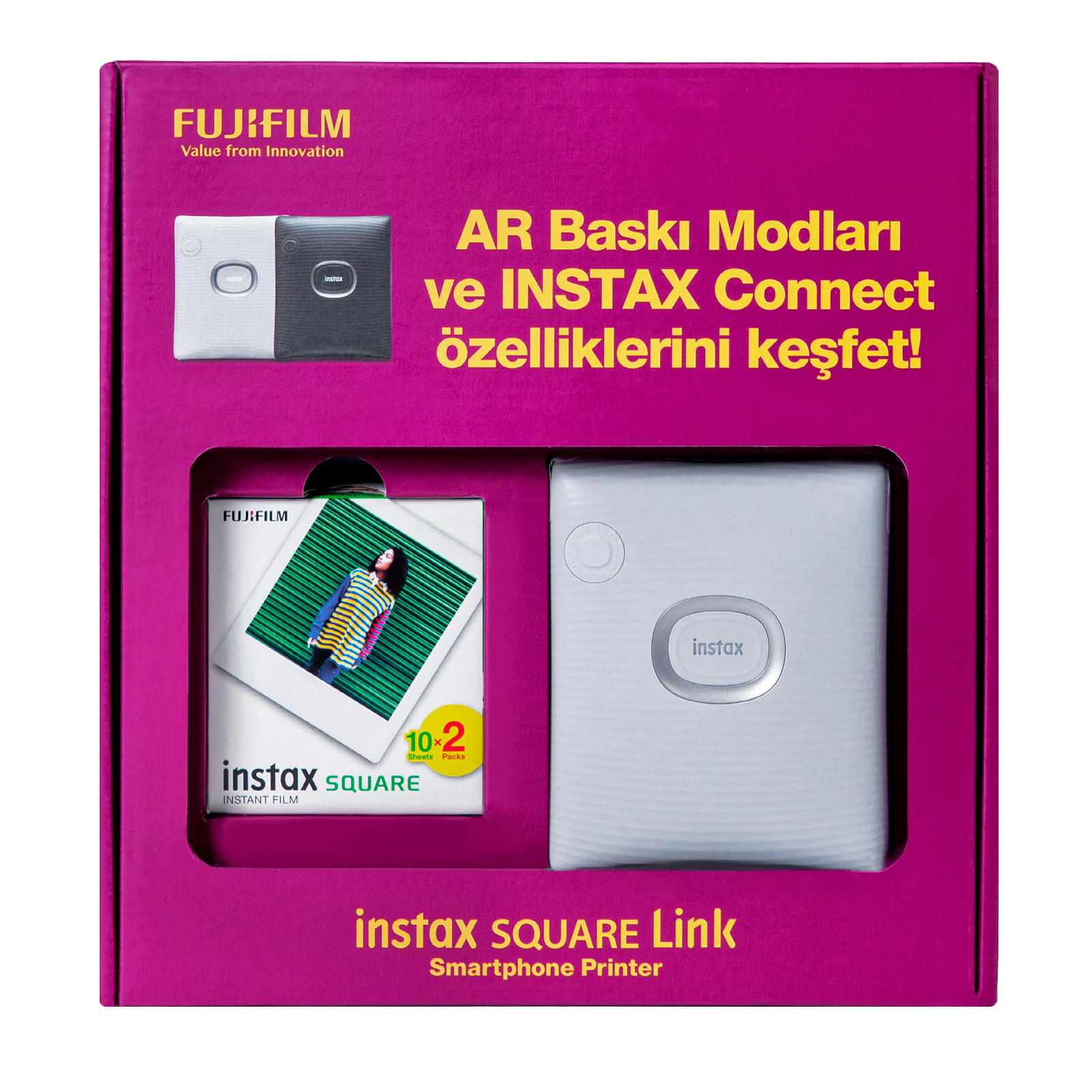 İçinde birden fazla eşya bulunan bir yazıcı kiti. Kit, beyaz bir yazıcı ile pembedir.