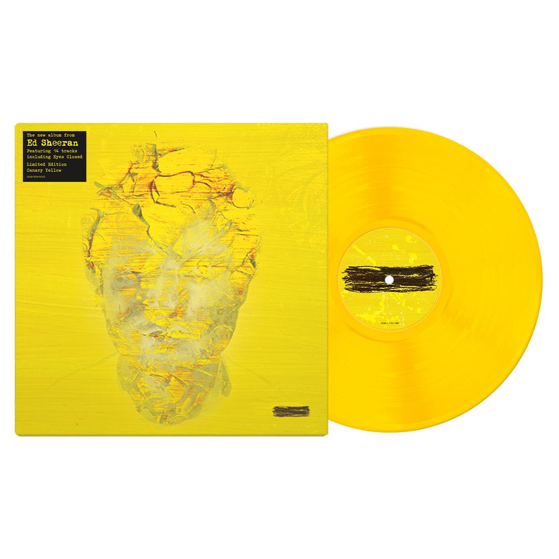 Pochette d'album jaune d'Ed Sheeran et disque vinyle sur fond blanc.