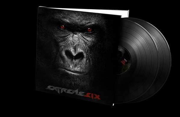 Albumcover mit Gorillagesicht und roten Augen, schwarze Schallplatten sichtbar. Text 'EXTREME SIX' auf dem Cover.