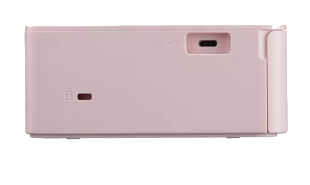 Üzerinde bir USB bağlantı noktası ve bir kilit göstergesi bulunan pembe, dikdörtgen bir cihaz.