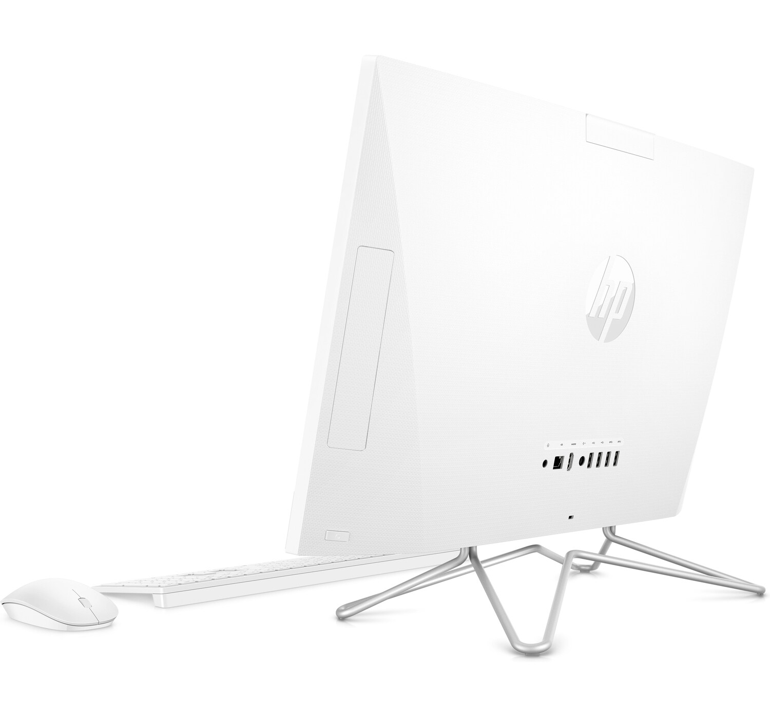Una computadora de escritorio blanca. La parte trasera está en ángulo hacia el espectador. El ratón y el teclado están delante.