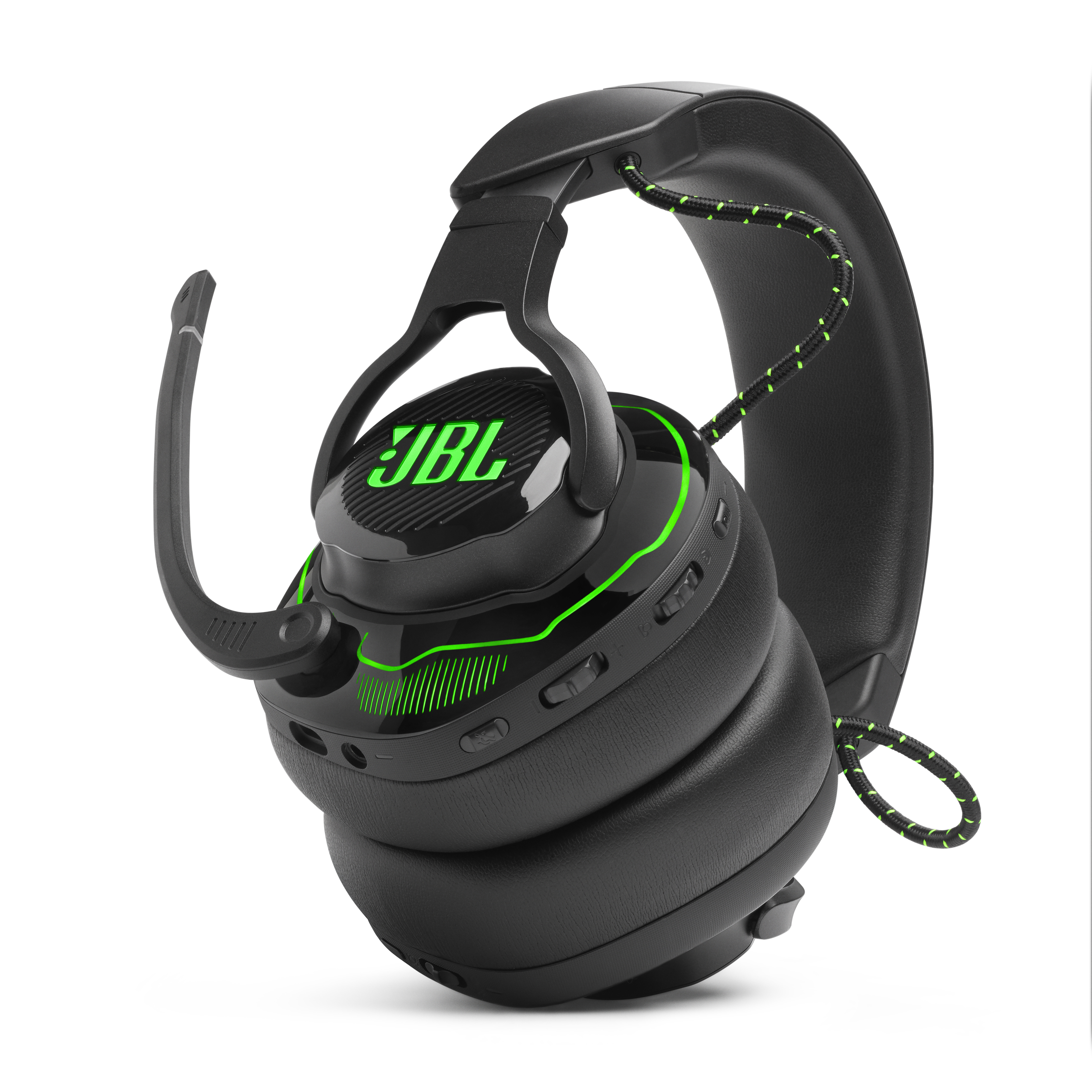 Schwarzes JBL Gaming-Headset mit grünen Akzenten, Mikrofon und Bedienelementen.