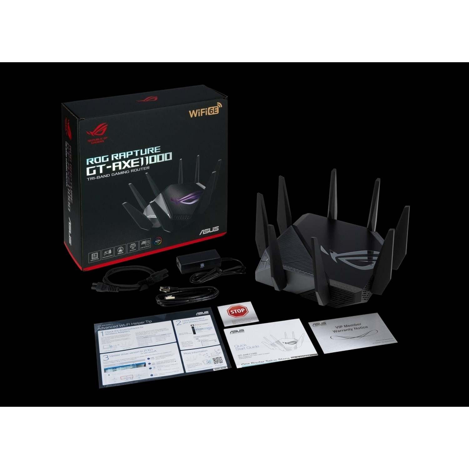 Routeur Asus ROG Rapture GT-AXE11000 dans la boîte, avec accessoires.