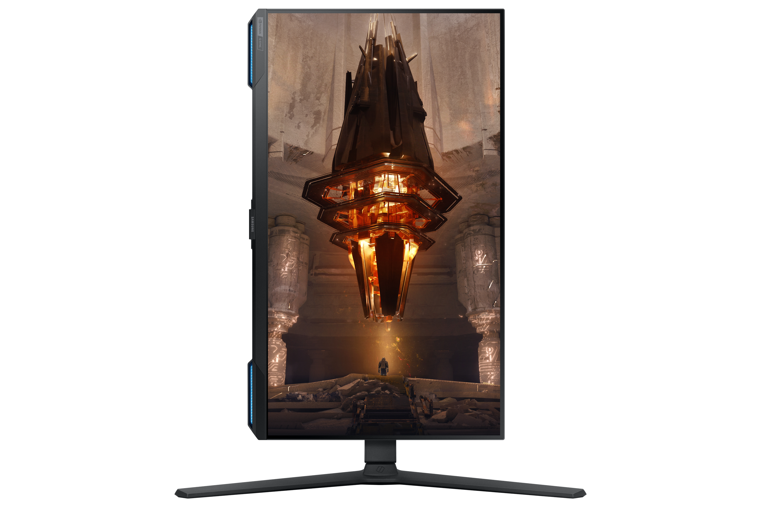 Monitor de juegos que muestra una escena futurista. Una persona está de pie frente a una estructura brillante.