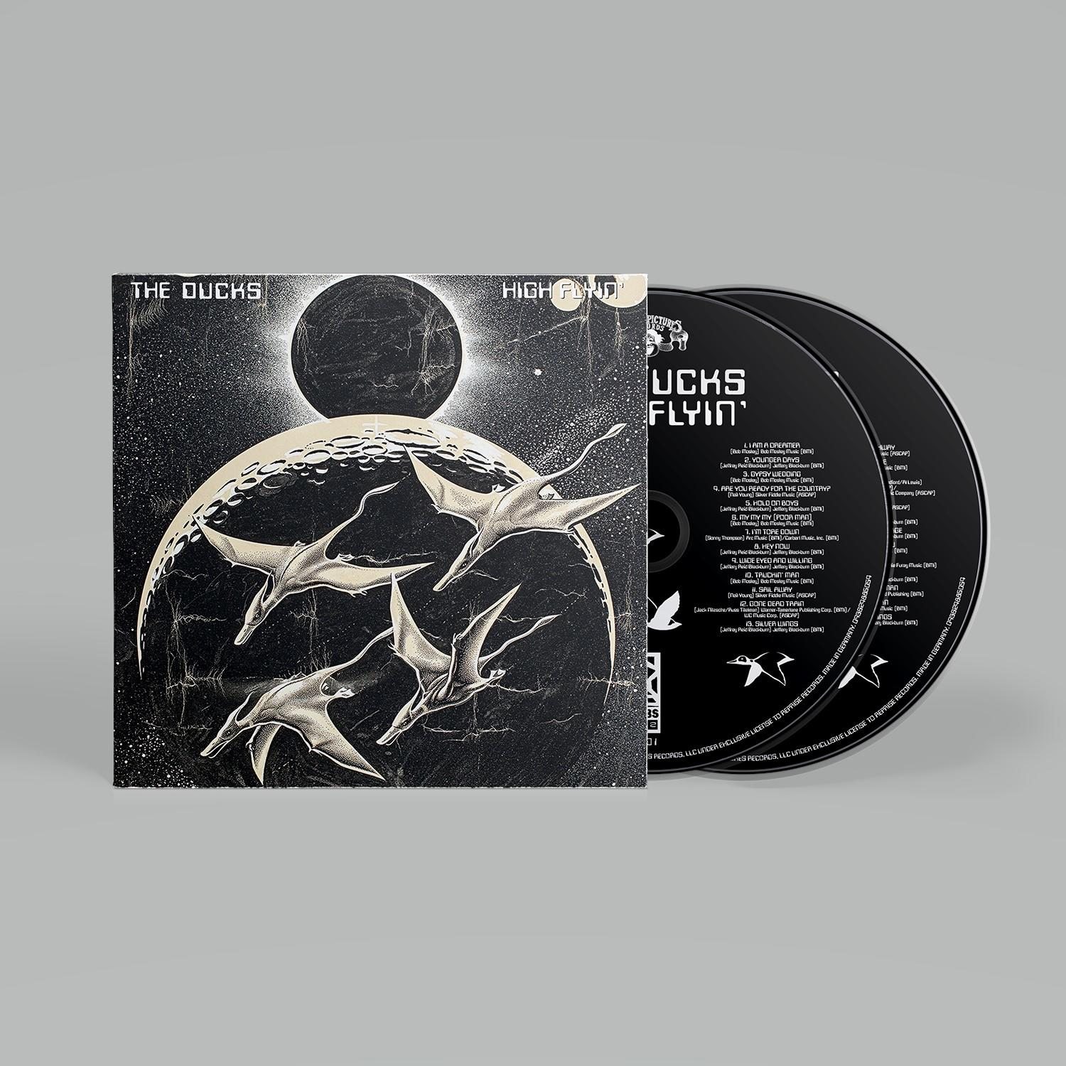 CD-Cover für 'The Ducks Flying'. Drei Entensilhouetten fliegen auf einem Mond.