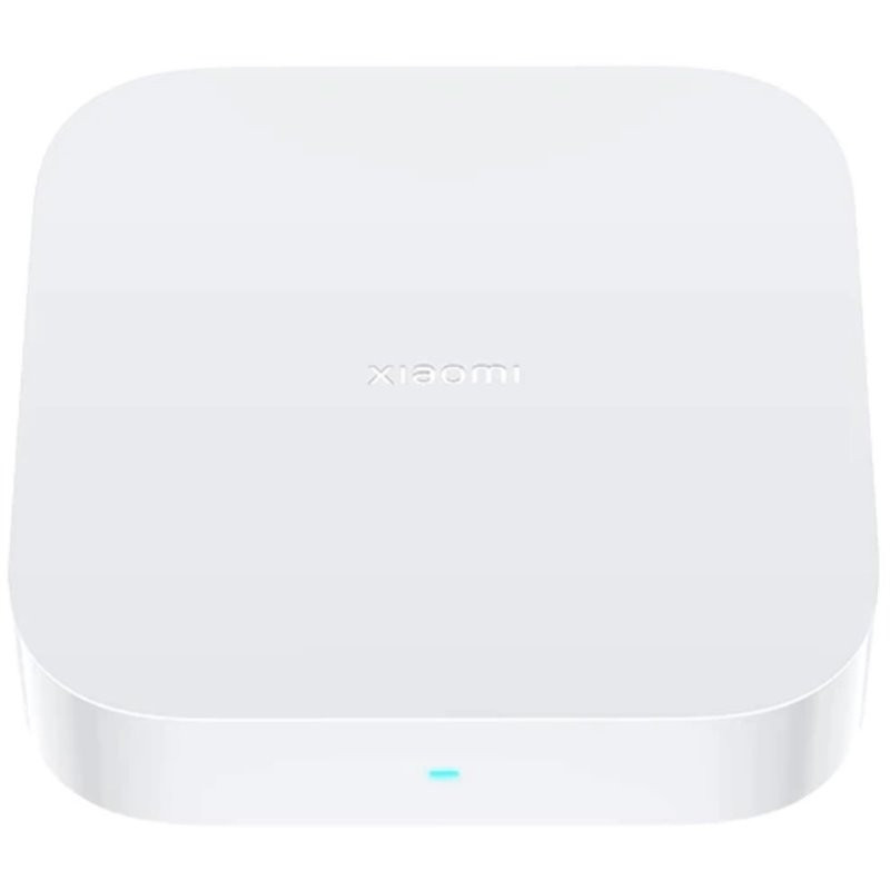 Ein weißes, rechteckiges Xiaomi-Gerät mit abgerundeten Kanten. Das Xiaomi-Logo ist oben zentriert. Ein kleines blaues Licht leuchtet.