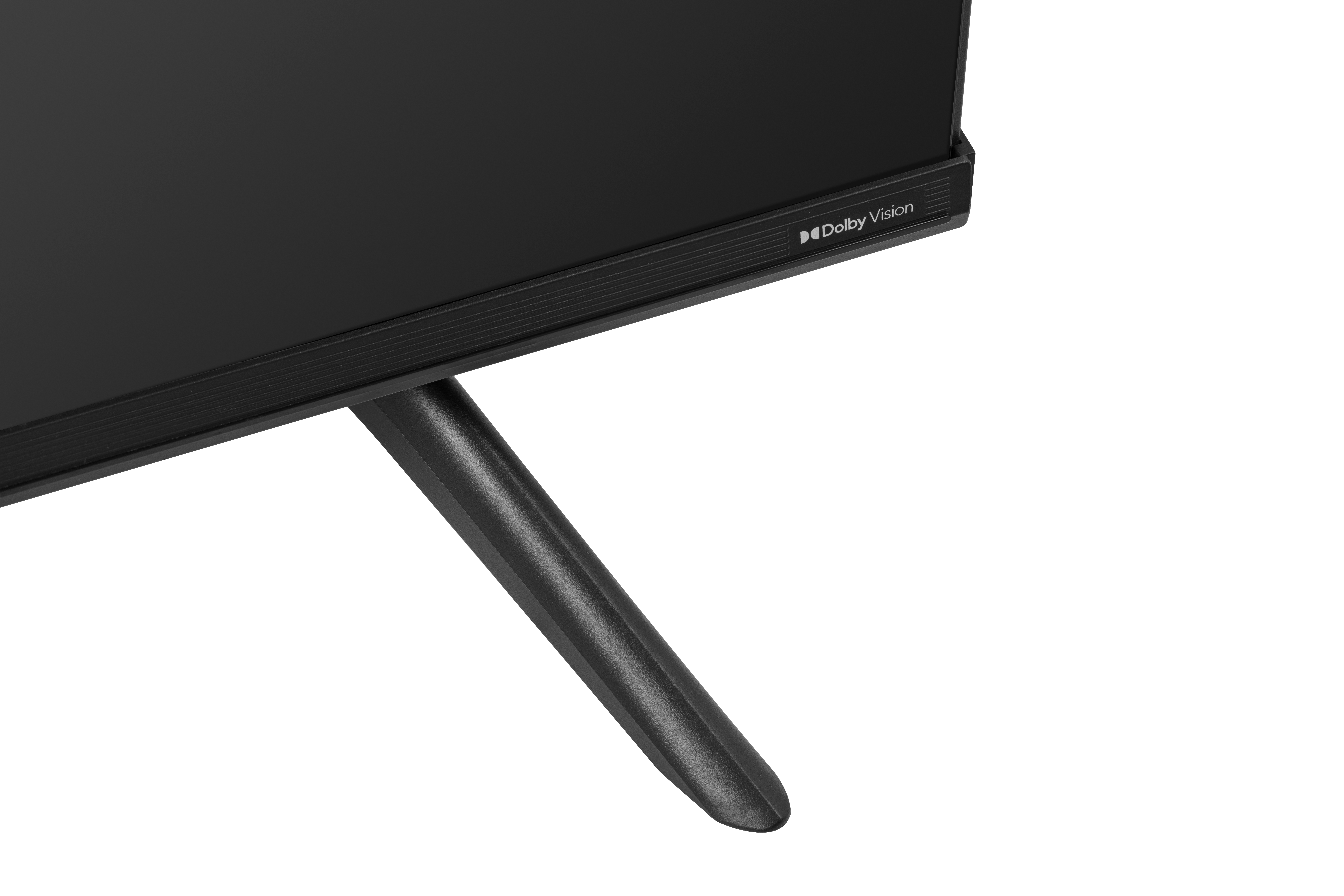 Primer plano de la base del soporte de TV y la parte inferior de la pantalla, oscuro.