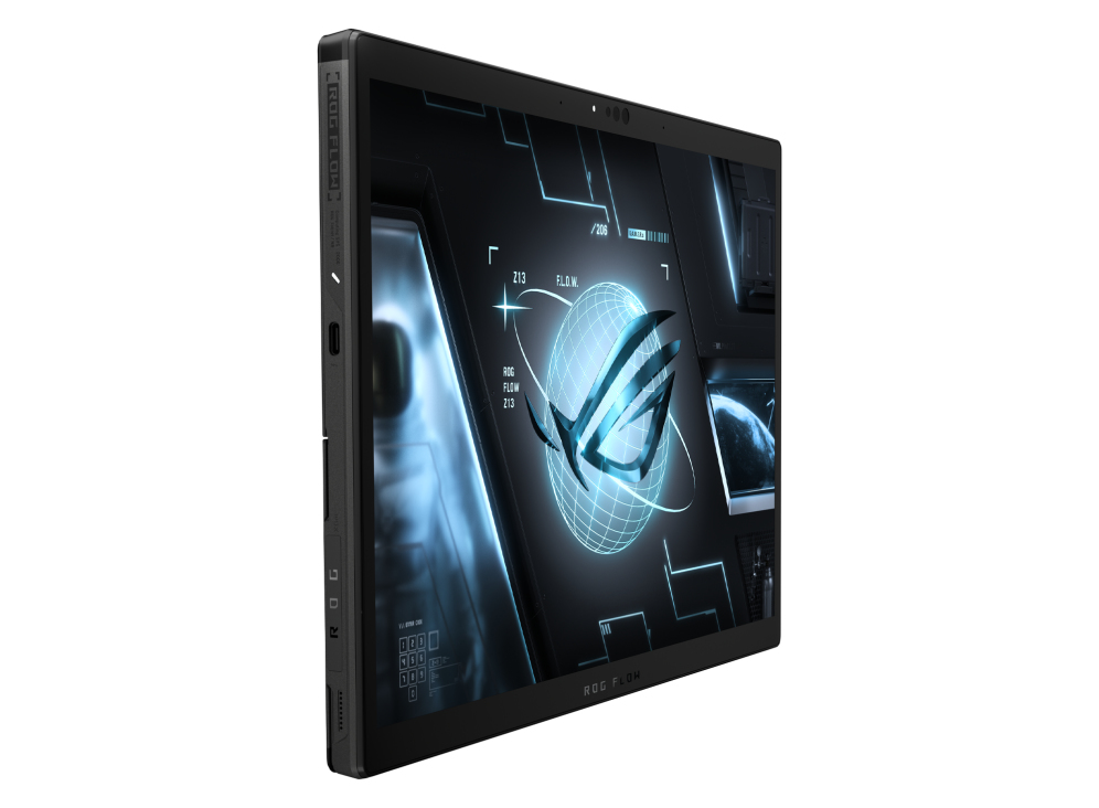 Una computadora portátil negra, en ángulo, mostrando una interfaz futurista en la pantalla.