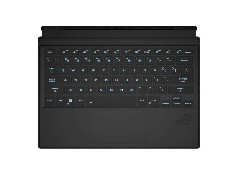 Teclado de portátil negro con teclas iluminadas y panel táctil.