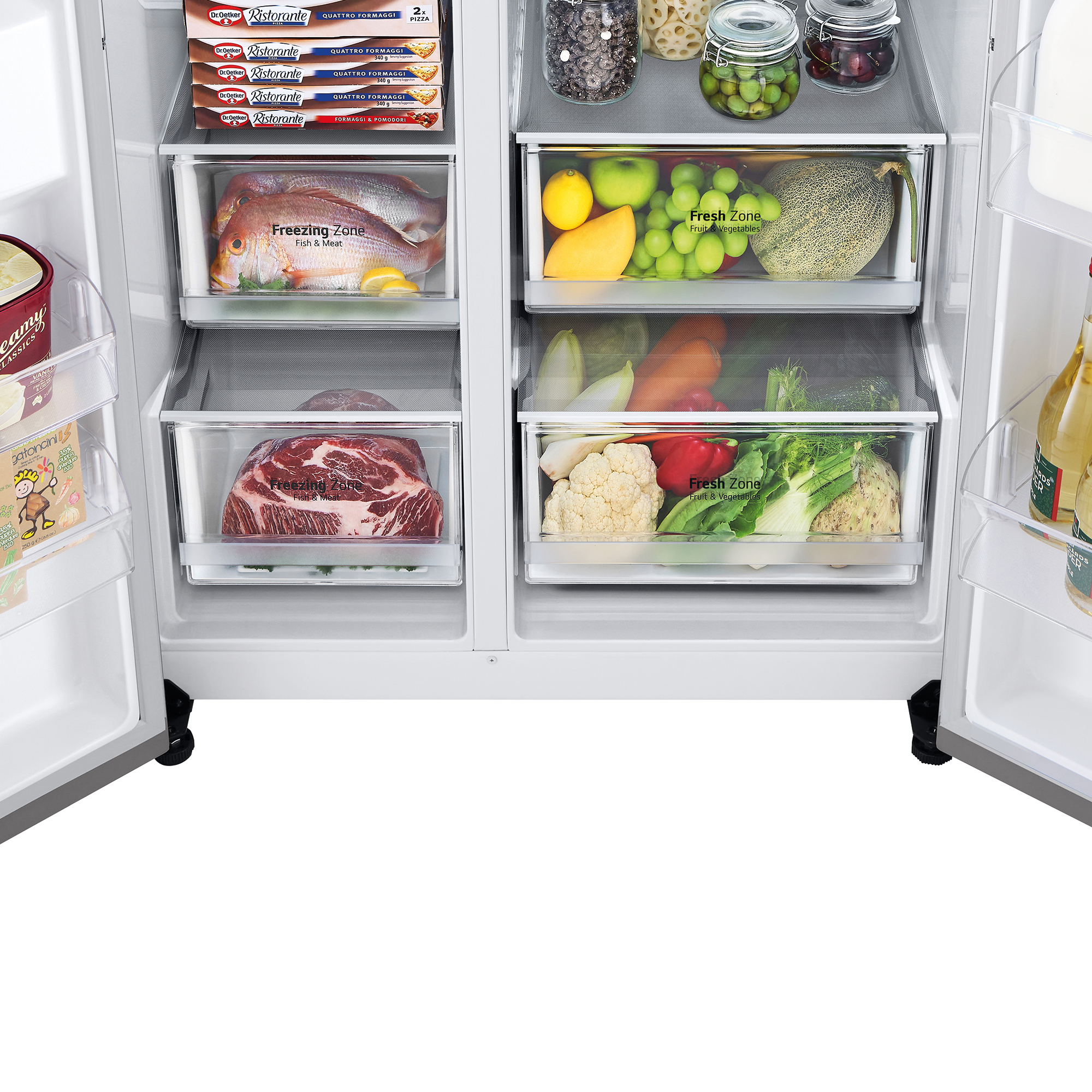 Interior de refrigerador con alimentos en cajones, zonas frescas y congeladas.
