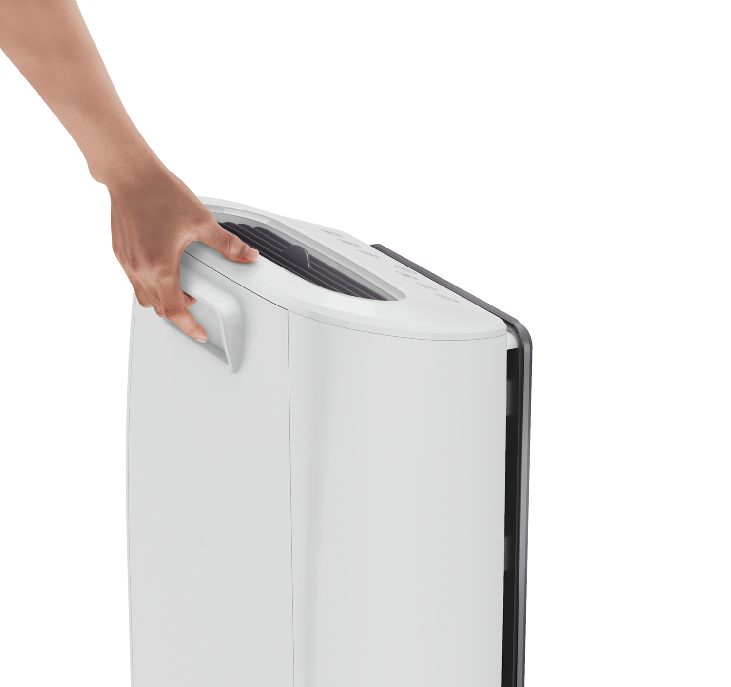 White air purifier on a grey background. A person's hand is grabbing the handle.