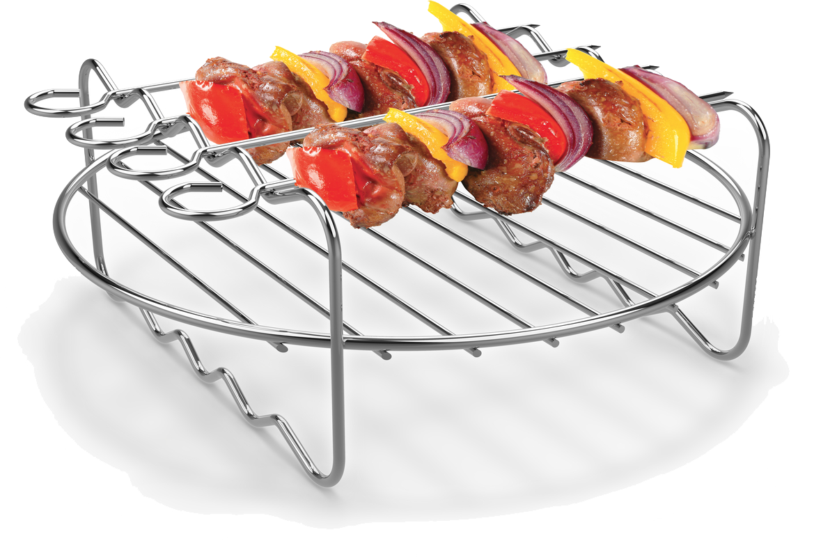 Metal grill with skewered meat and vegetables, like red peppers, onions and yellow peppers.