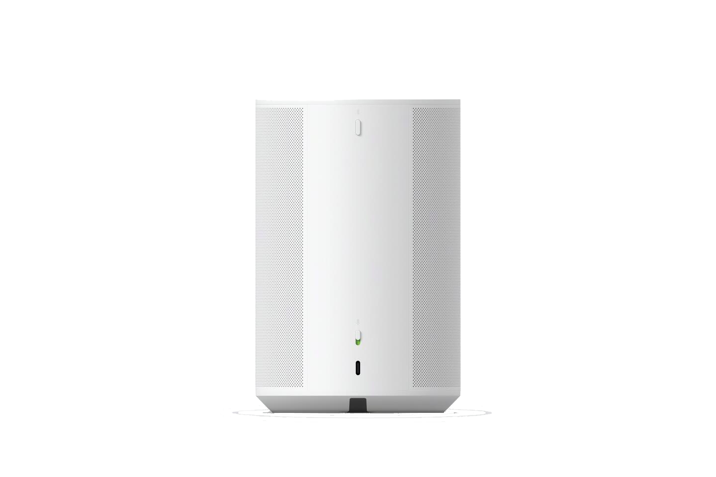 Un altavoz inteligente cilíndrico blanco con una luz verde sutil en la parte inferior.