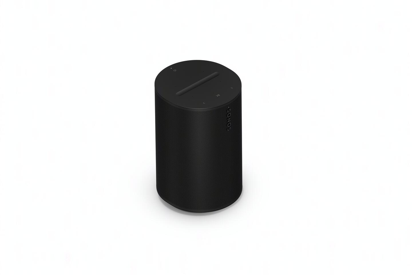 Un altavoz negro, cilíndrico sobre un fondo blanco. Tiene un diseño simple y minimalista.