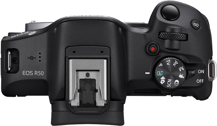 Fentről lefelé nézet egy fekete Canon EOS R50 kameráról. Különböző gombok és tárcsák láthatók.