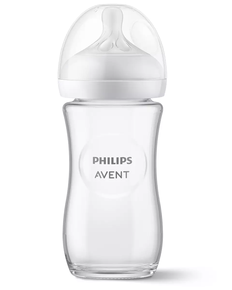 Átlátszó Philips Avent bébiüveg fehér cumival és kupakkal.