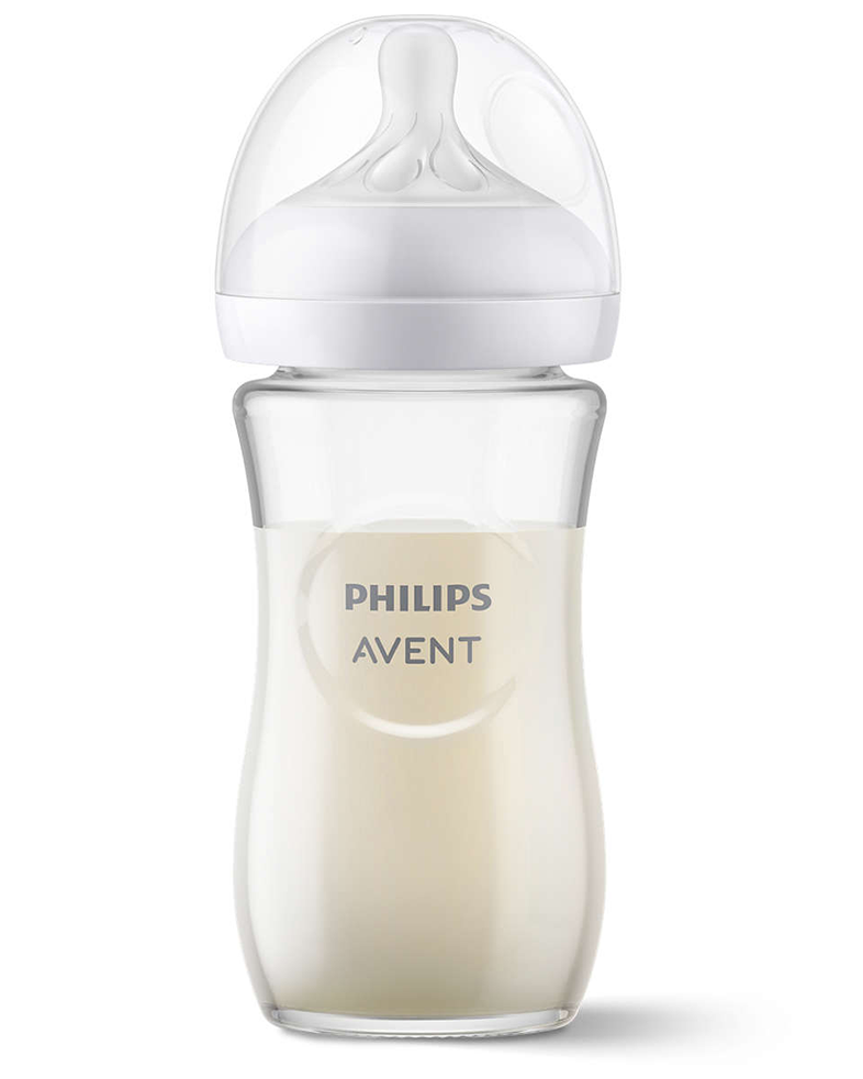 Egy bébiüveg tejjel töltve, látható a Philips Avent logó.
