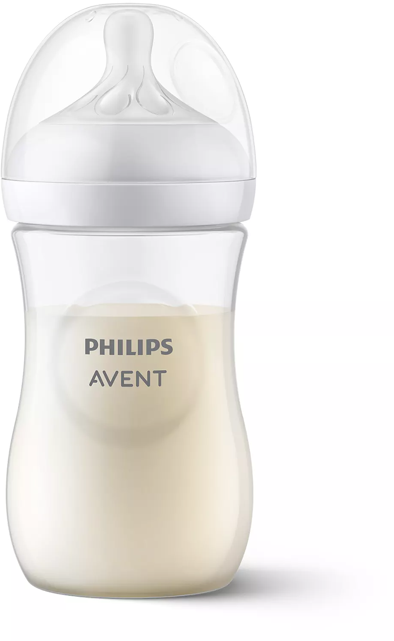 Fehér bébiüveg világossárga folyadékkal töltve, a Philips Avent logóval az üvegen.