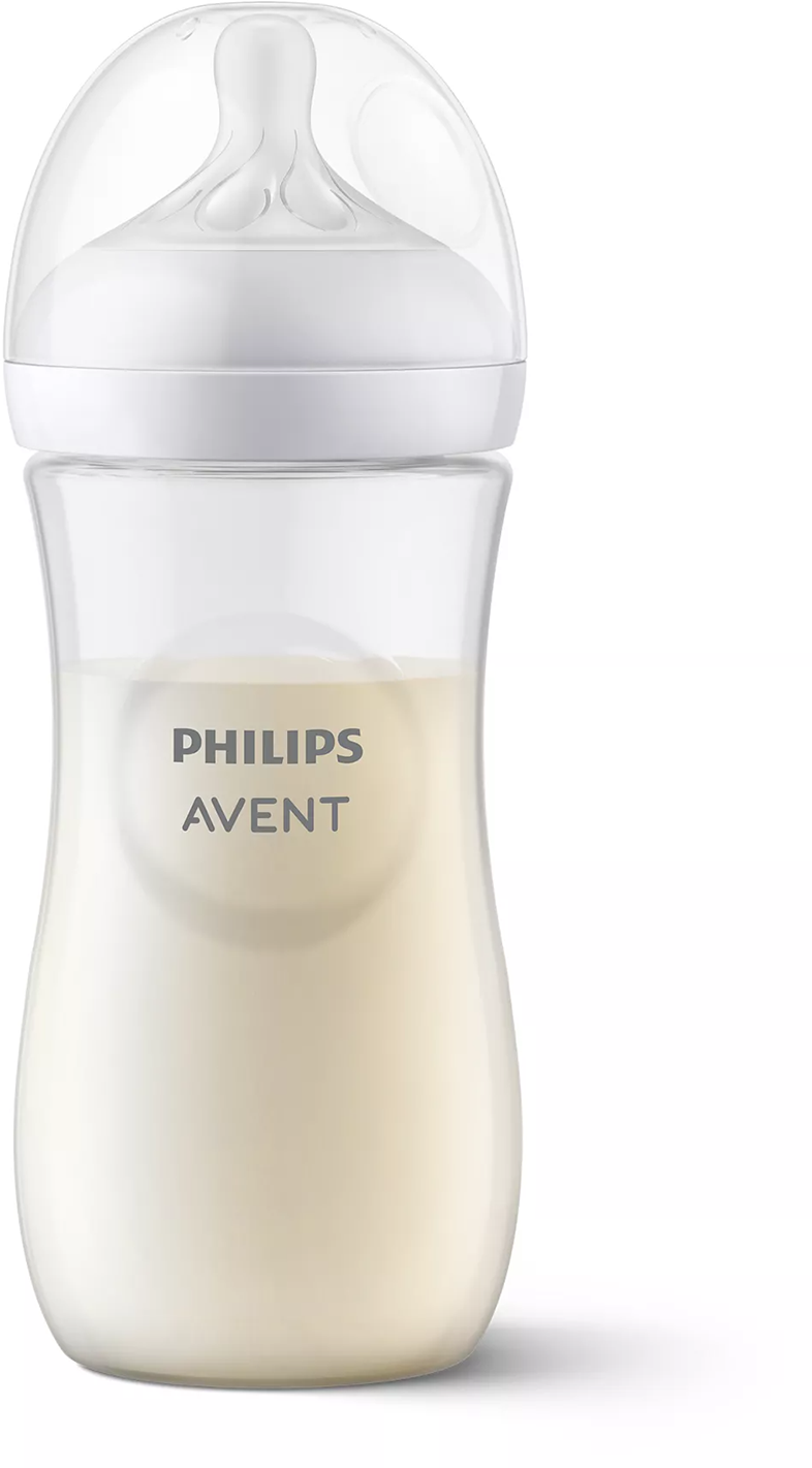 Philips Avent bébiüveg, tejjel töltve, fehér cumival és kupakkal.