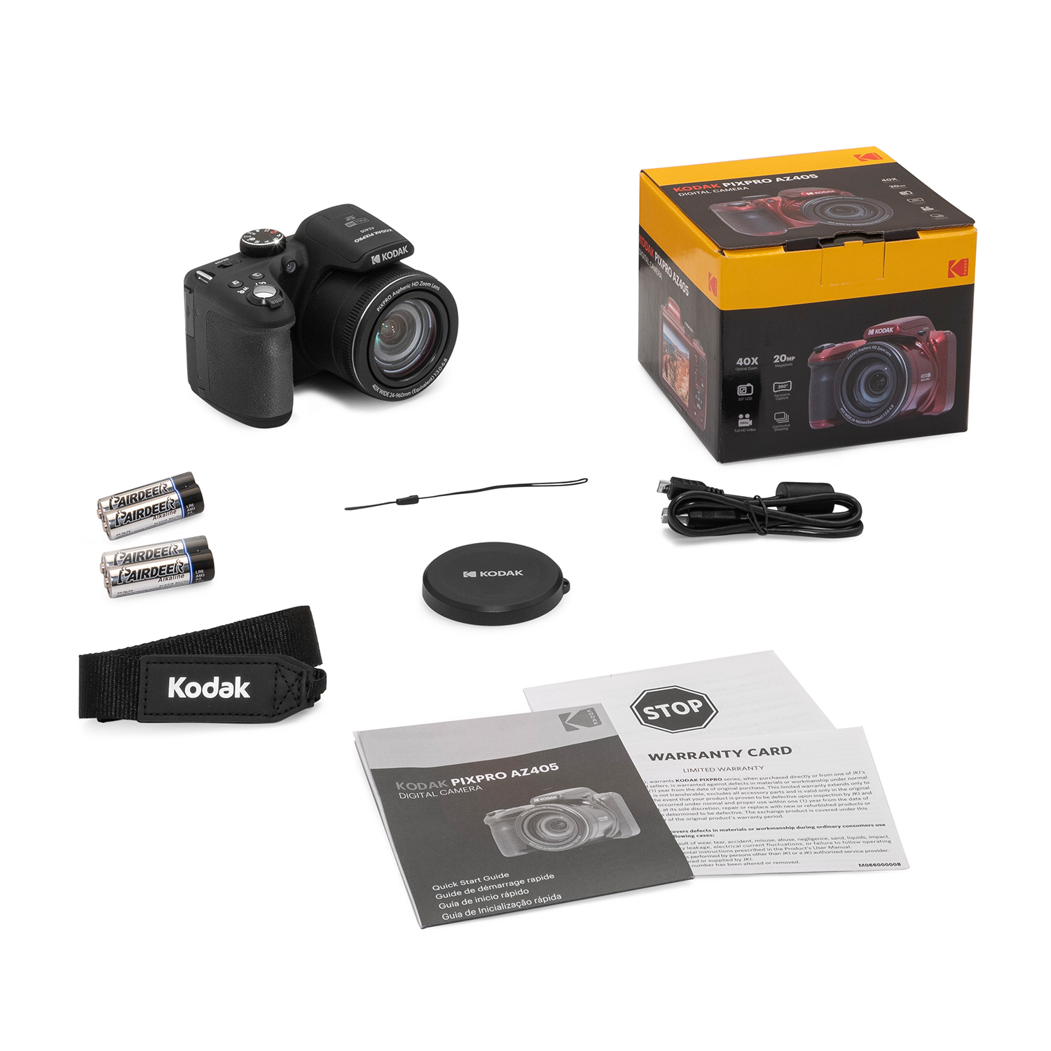 Fotocamera digitale Kodak, scatola, batterie, cinturino, tappo dell'obiettivo e fogli bianchi.
