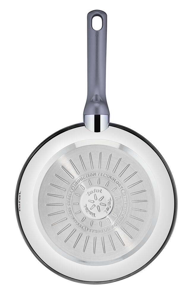 Tefal serpenyő alulnézete, indukciós technológiai részletekkel.