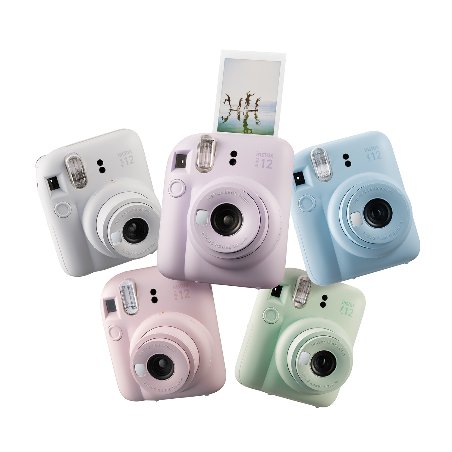 Cinque fotocamere instax di diversi colori su sfondo bianco.
