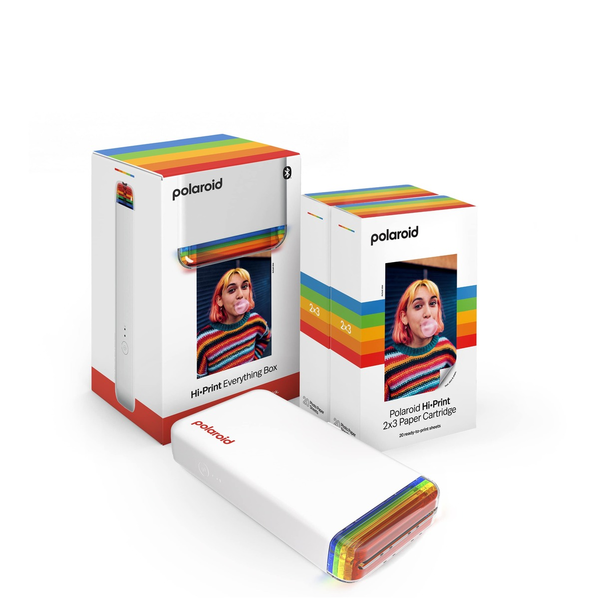Polaroid Hi-Print Boxen und Drucker, Regenbogenakzente, Mädchen bläst Kaugummi, druckfertige Blätter.