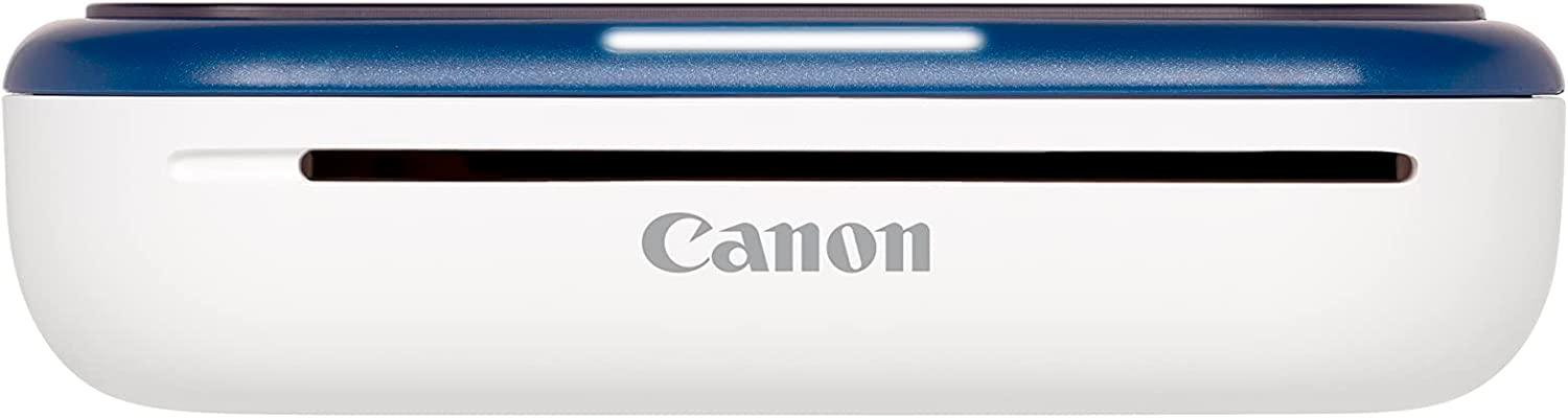 Una impresora fotográfica Canon blanca y azul, vista superior.