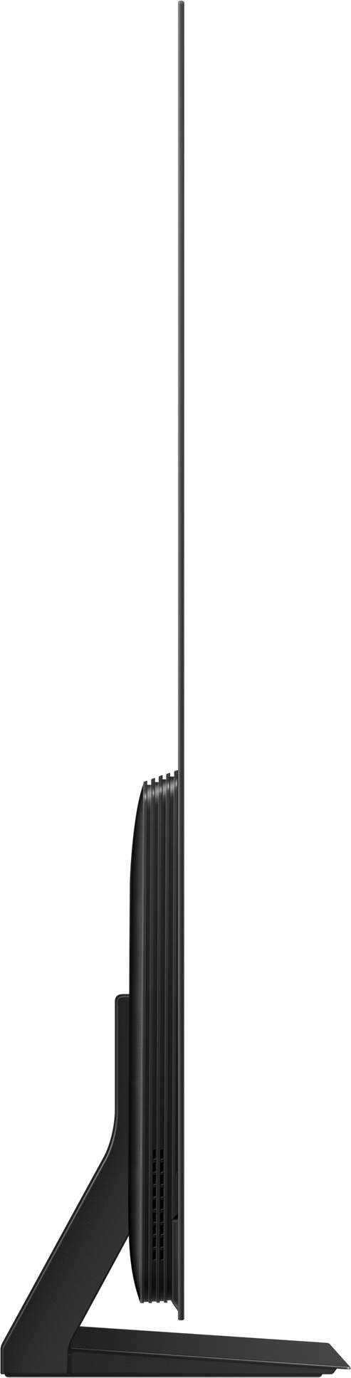 Vue de côté d'une télévision noire élégante avec un pied, sur un fond sombre.