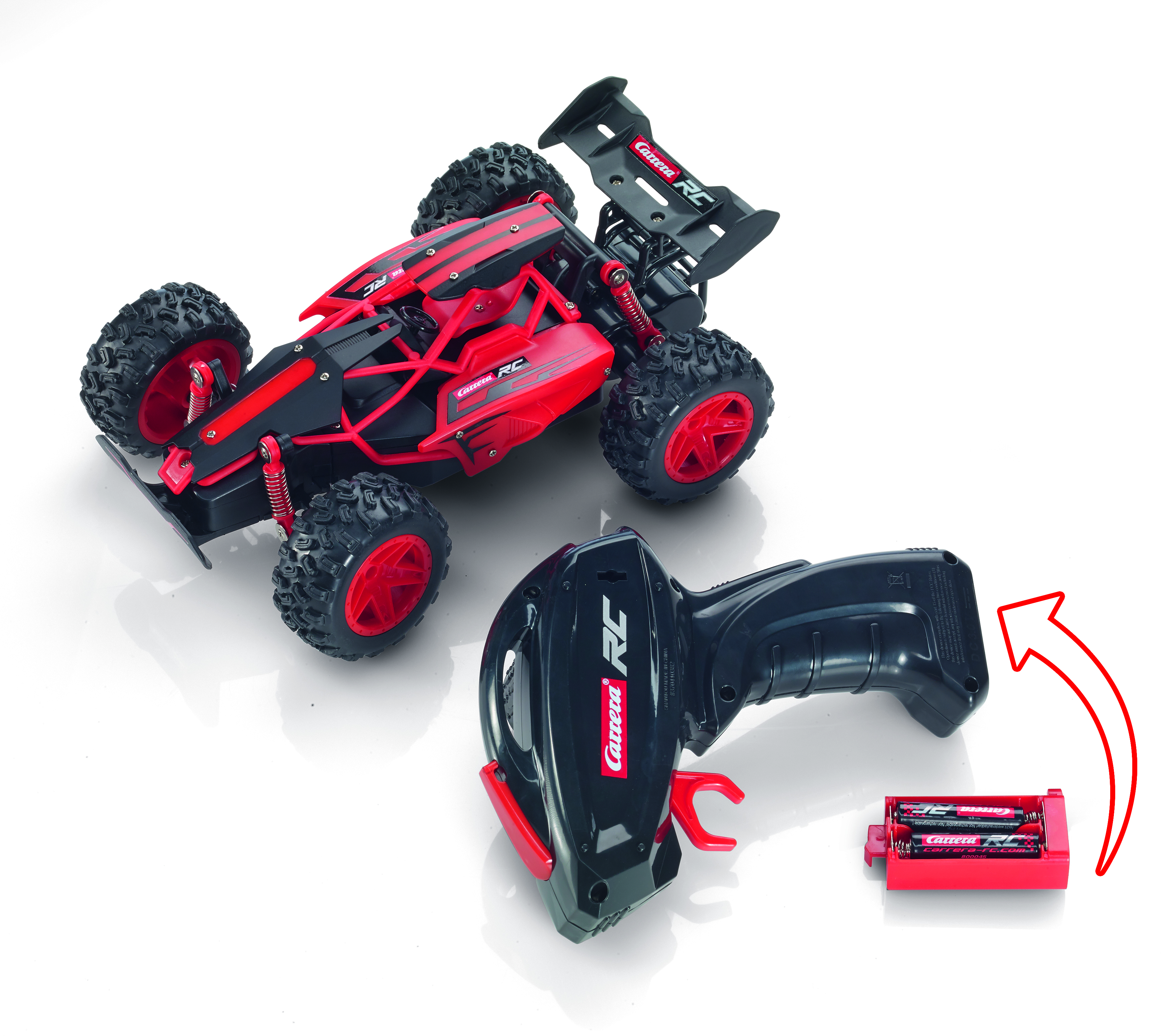 Ein rot-schwarzes Carrera RC-Auto mit Fernbedienung und Akkupack.