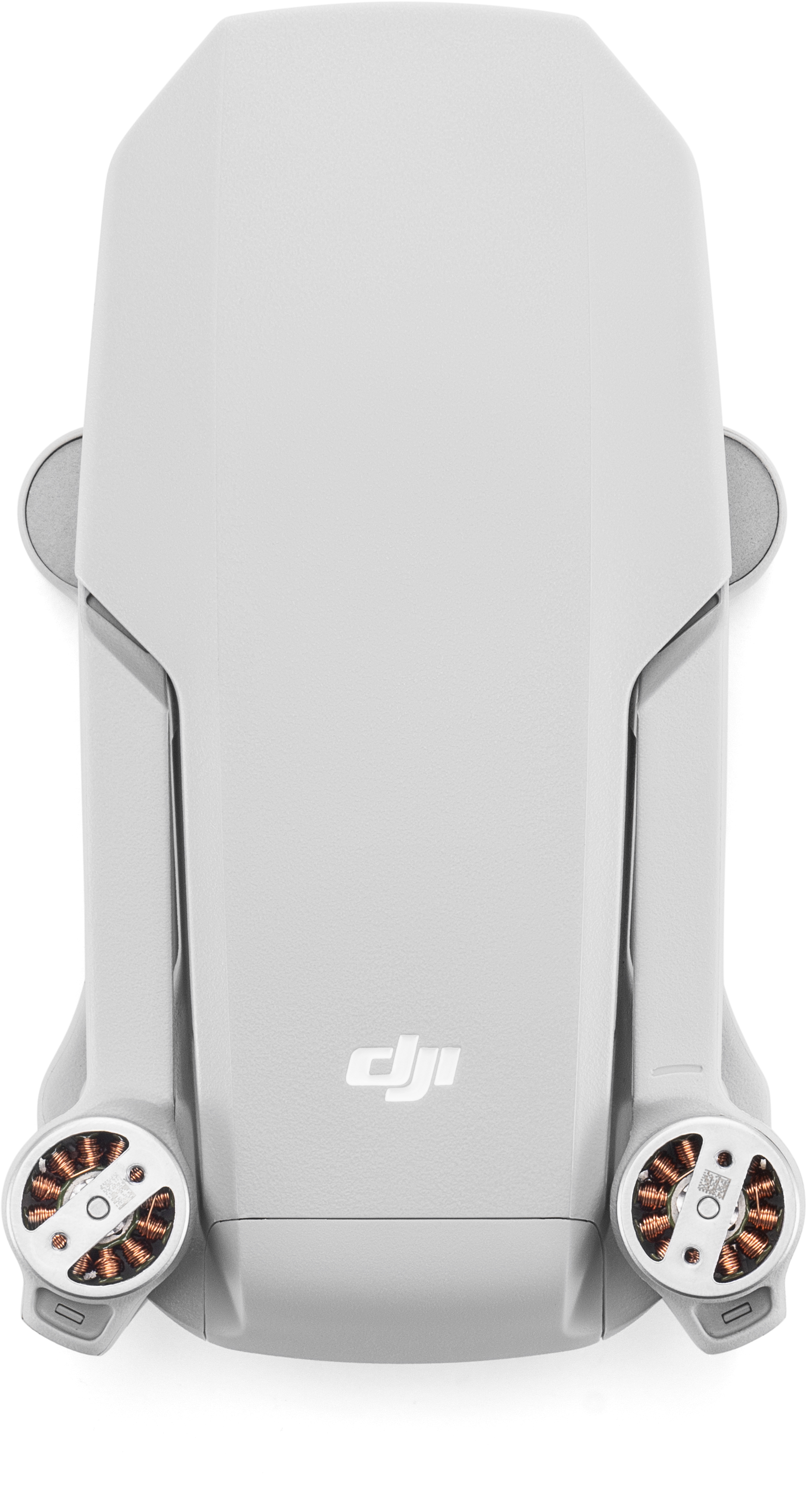 Weiße Drohne mit gefalteten Armen, DJI-Logo sichtbar, direkt von oben gesehen.