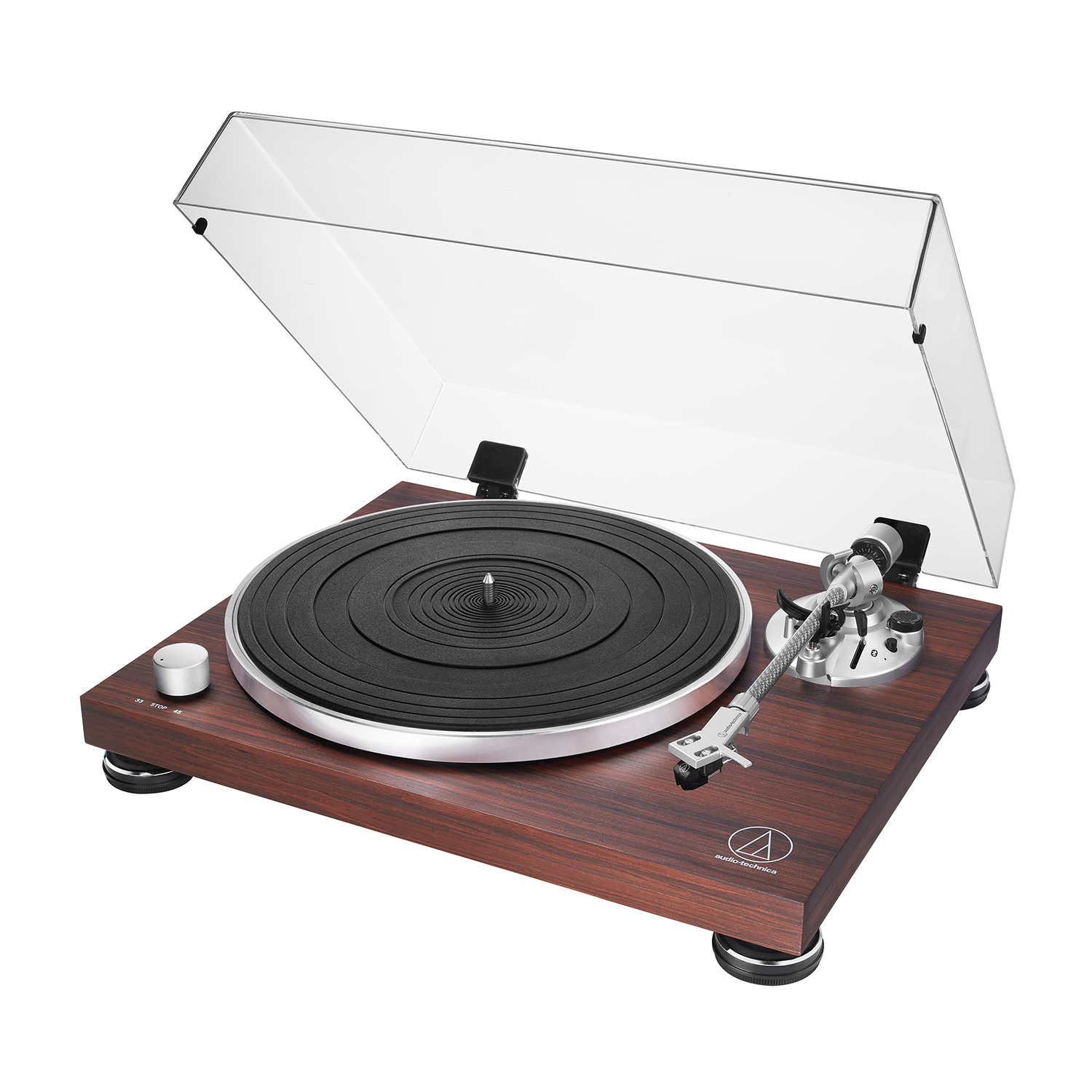 Giradischi, finitura legno, con un disco nero sul piatto e una copertura trasparente.