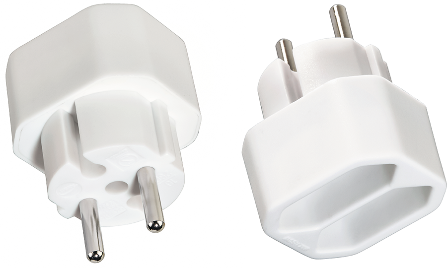Two white travel adapters. One has three prongs, the other has two slots.