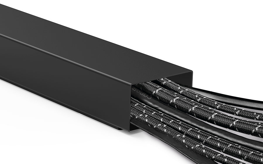 A black cable cover with multiple cables inside. Cables are black and white.