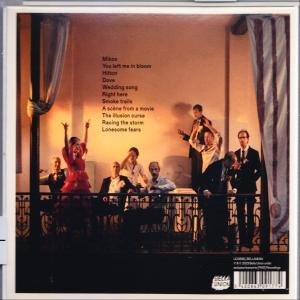 Back cover of a CD album showing a group of people on a balcony. Text is along the left side of the image.