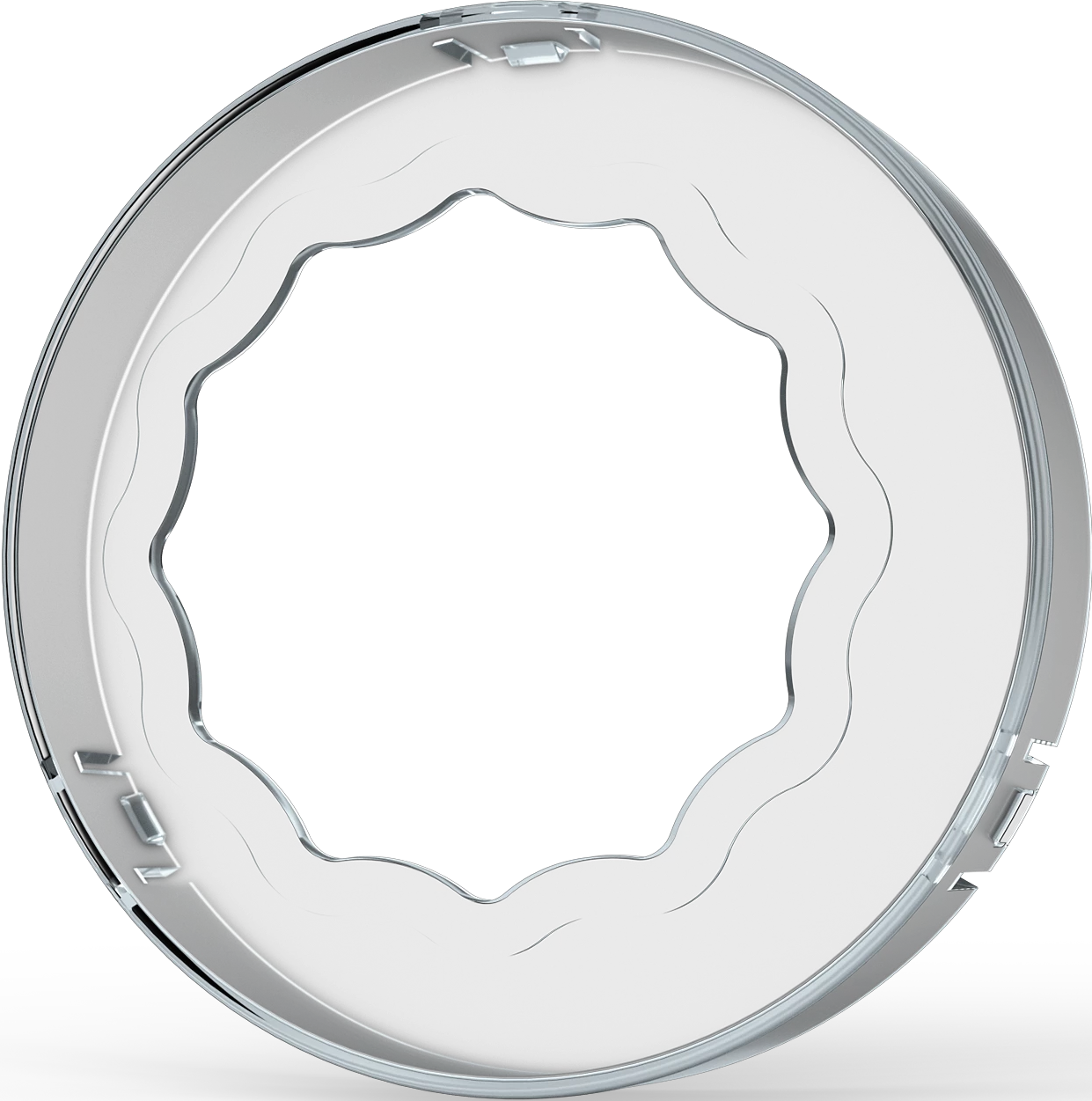 Kreisförmiger, chromfarbener Ring mit gewelltem Innenrand. Weißer Hintergrund.