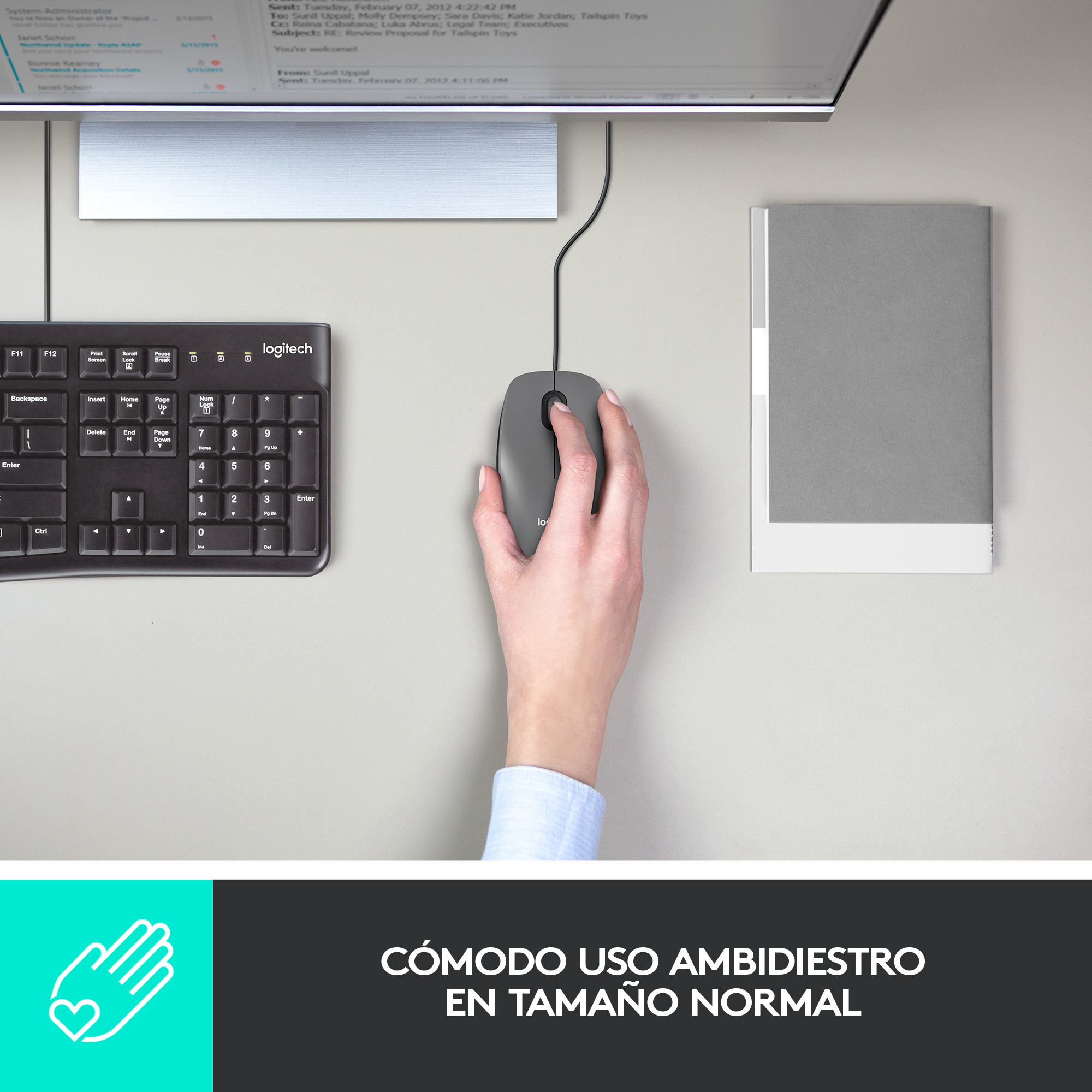 Mano usando un ratón gris con teclado y monitor al fondo. Texto en español.