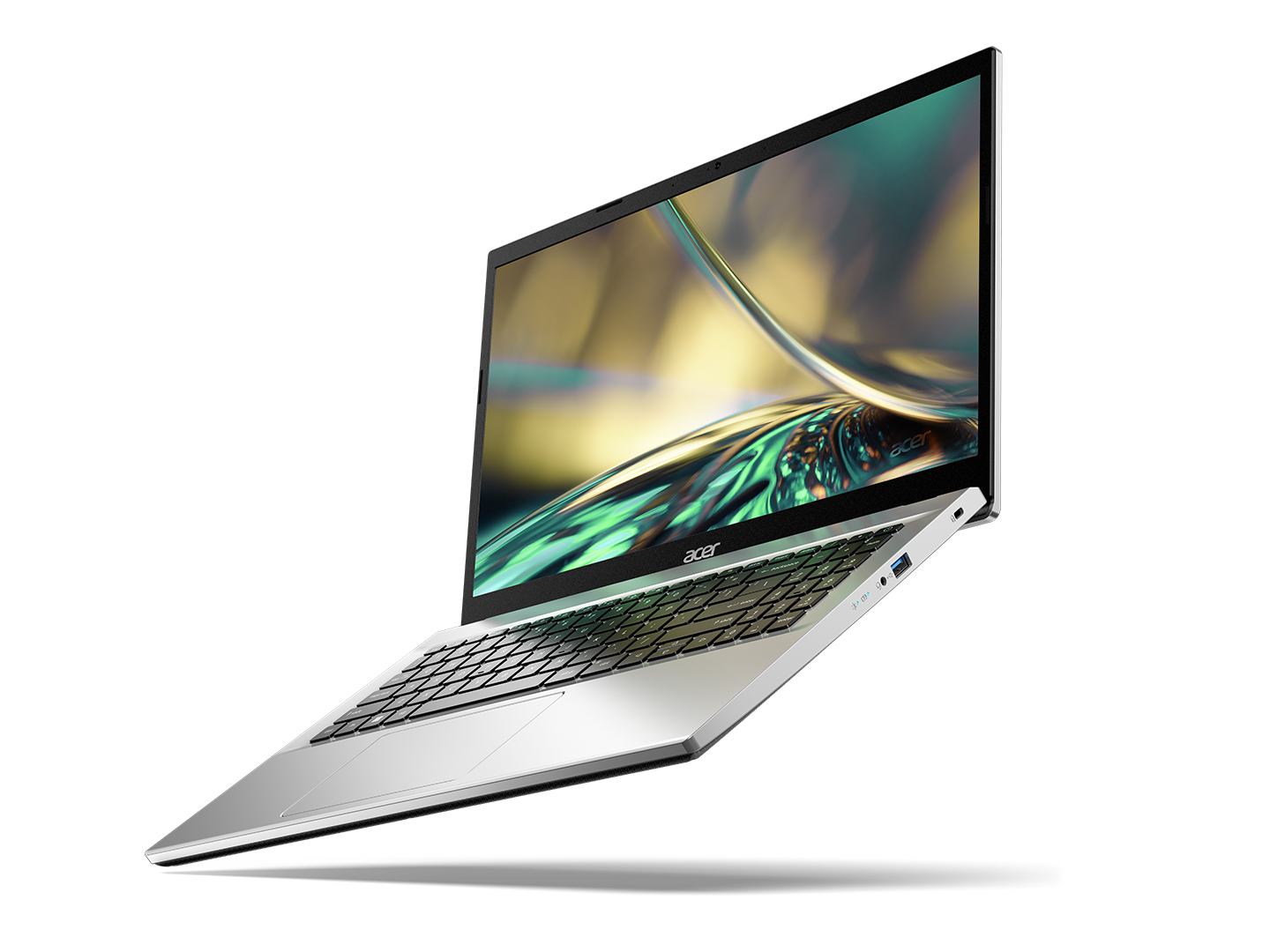 Portátil plateado en ángulo sobre un fondo negro. La pantalla muestra un diseño verde y amarillo, con el logo de Acer.