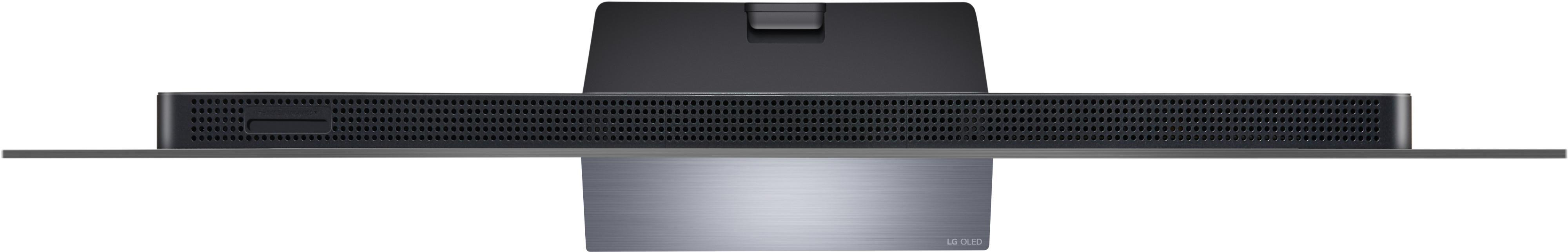 Draufsicht auf einen schwarzen Fernseher mit silberner Basis, Rückseite.