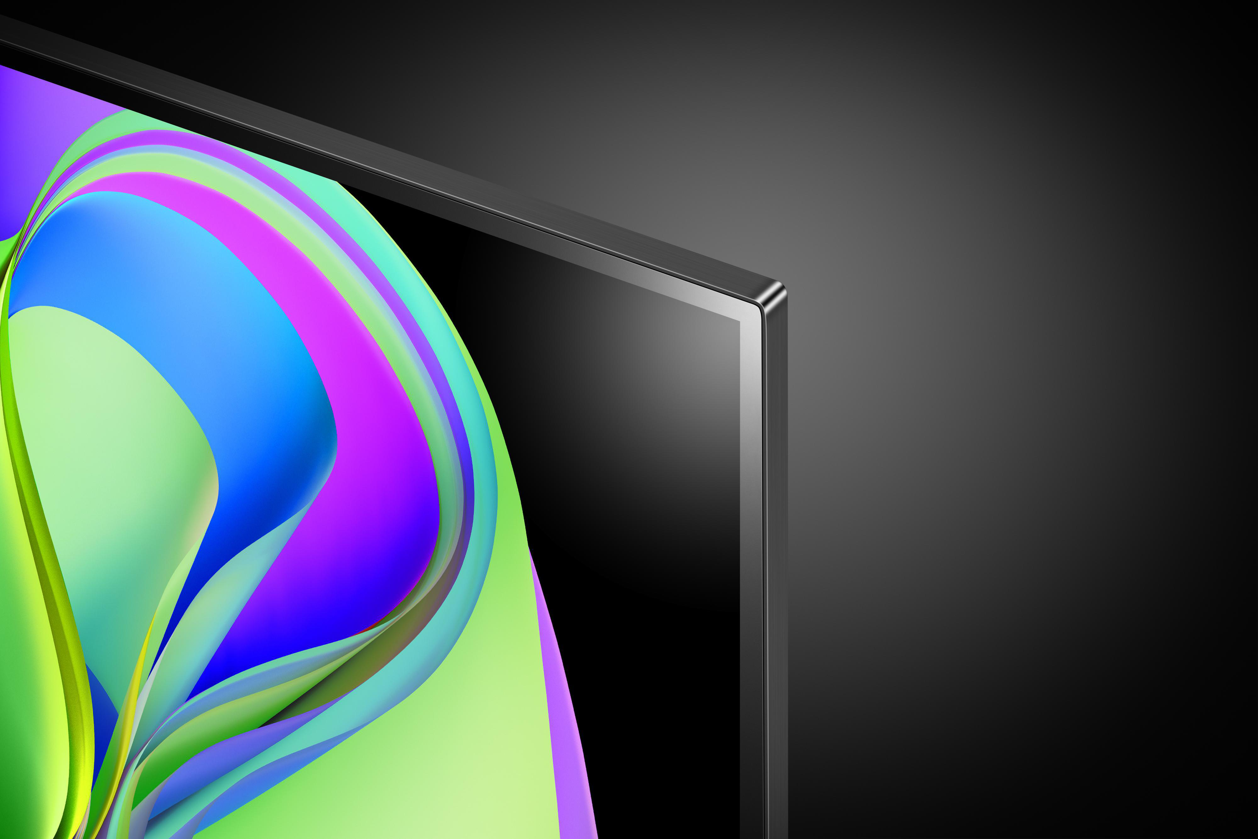 Nahaufnahme-Ecke eines Fernsehers mit farbenfrohem, abstraktem Design.