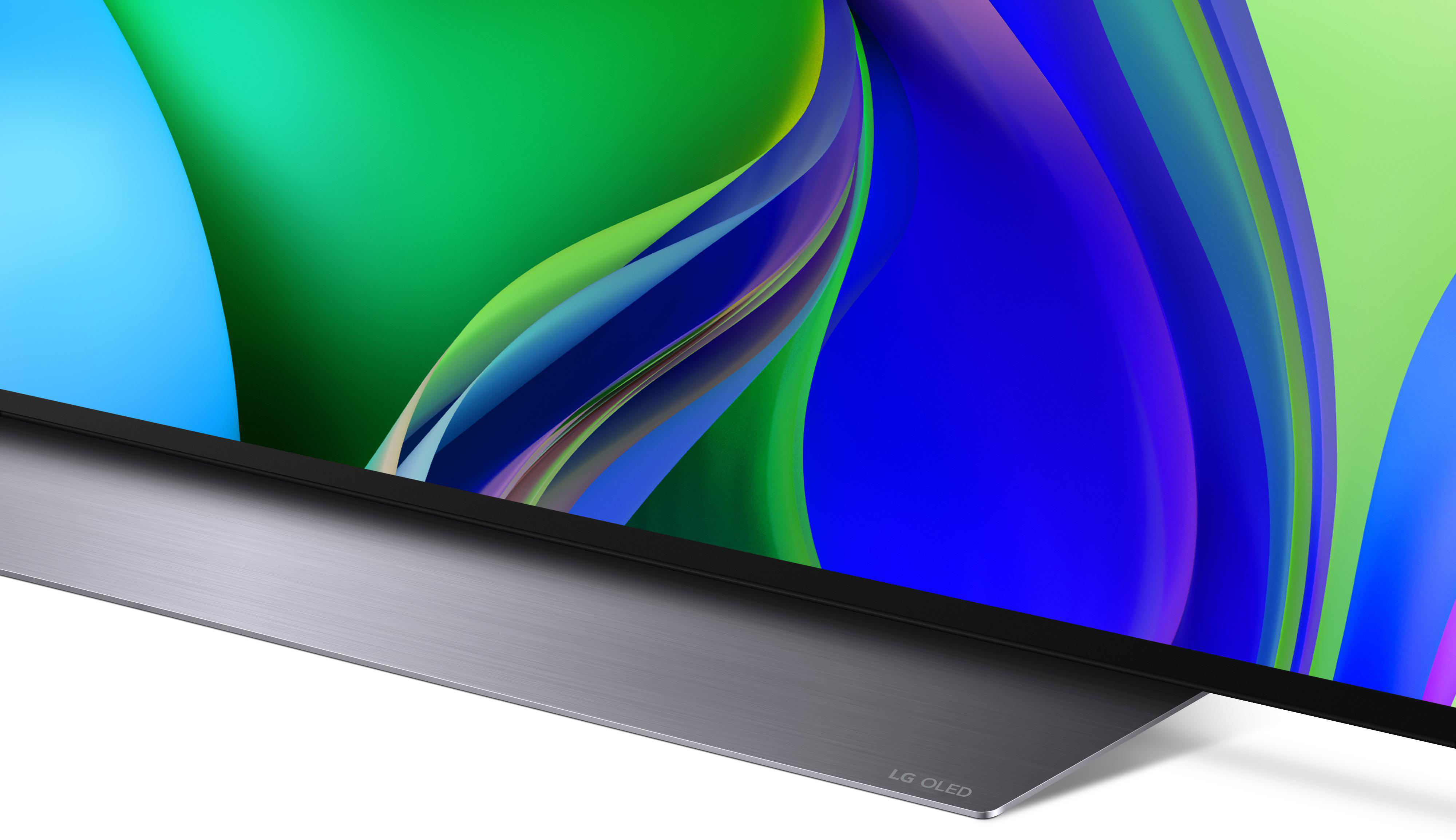 Unterseite eines Fernsehers mit silbernem Ständer und dem LG OLED-Logo.