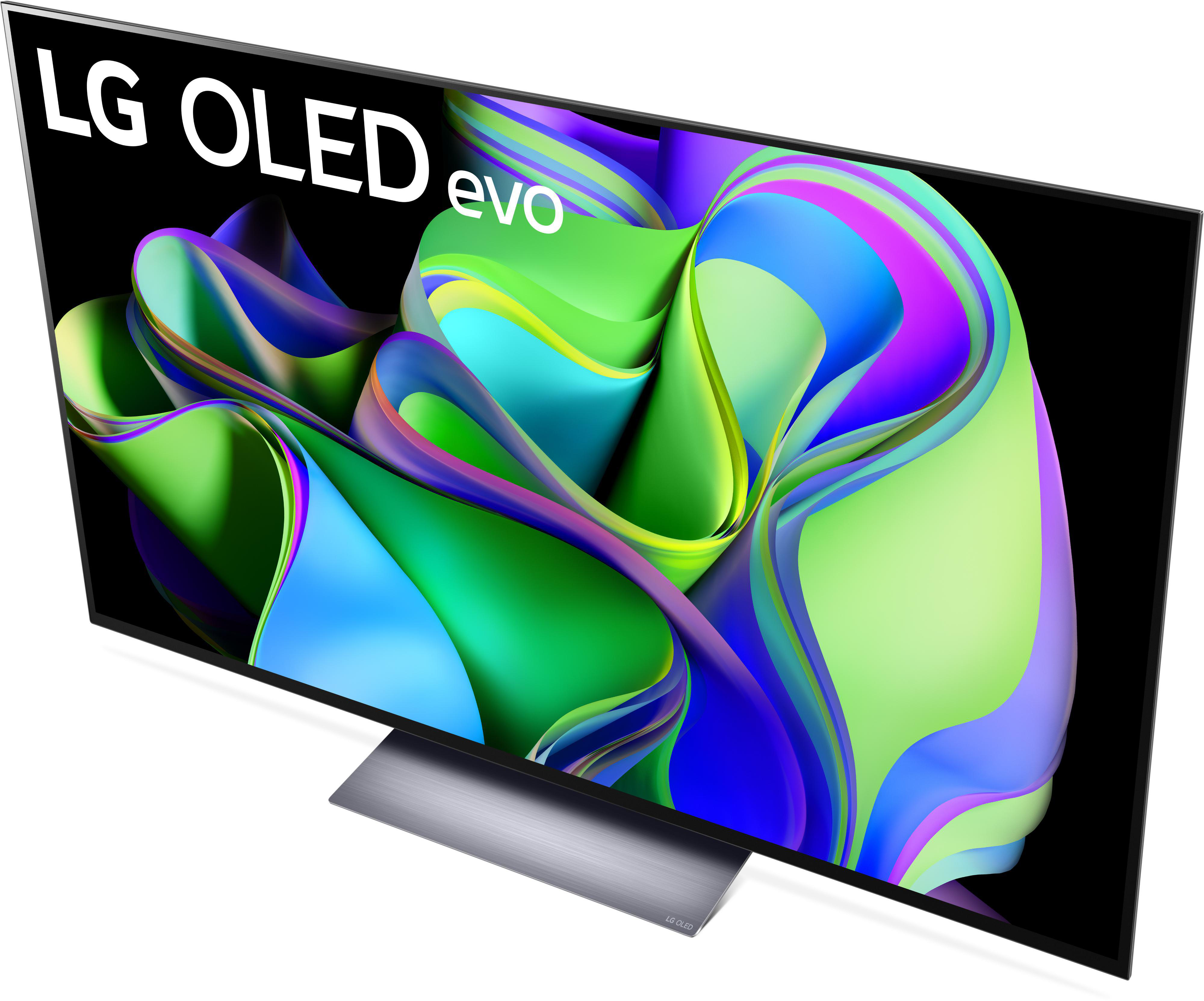 LG OLED evo TV, Draufsicht. Schwarzer Bildschirm mit bunten abstrakten Formen.