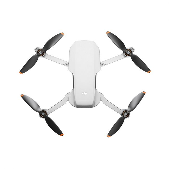 Un dron blanco con hélices negras, visto desde arriba, sobre un fondo blanco.