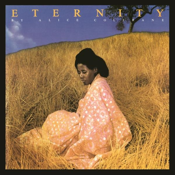 Album borító, nő a magas fűben ül, 'Eternity' cím, Alice Coltrane.