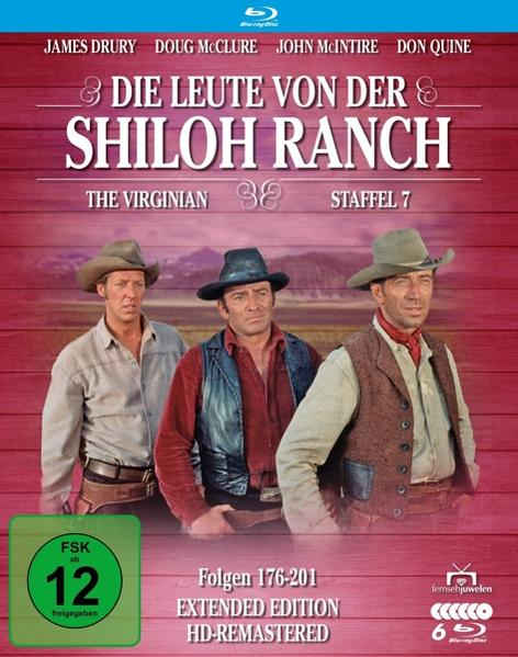 DVD-Cover: Drei Männer mit Cowboyhüten, stehend vor rotem Holzhintergrund.